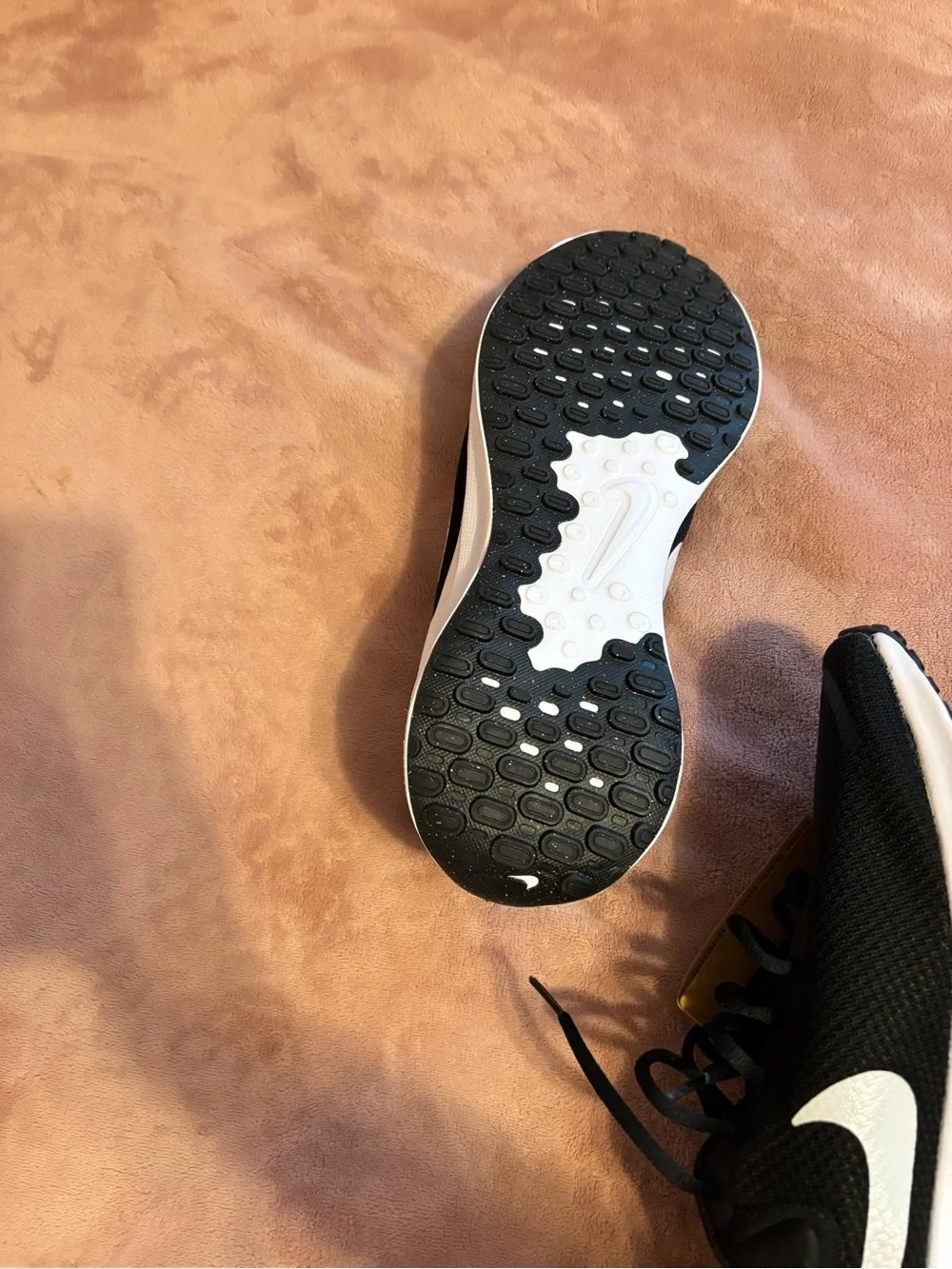 Nike Black Athletic Running Shoes with White Swoosh